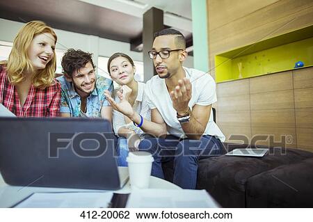 People working together in office View Large Photo Image Stock Image - People working together in office. Fotosearch