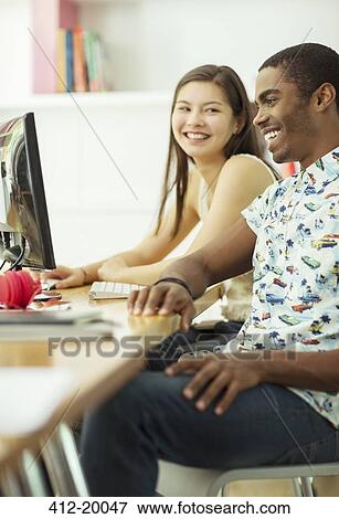 People working together in office View Large Photo Image Stock Photo - People working together in office. Fotosearch