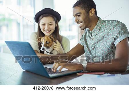 People working together in office View Large Photo Image Stock Photo - People working together in office. Fotosearch