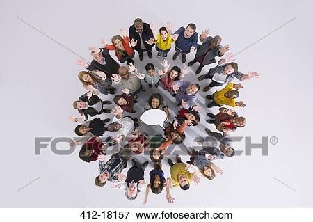 Portrait of business people in circle holding thought bubble View Large Photo Image Stock Photo - Portrait of business people in circle holding thought bubble. Fotosearch