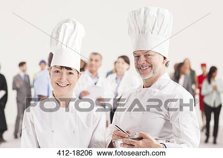 Portrait of confident chefs View Large Photo Image Stock Photograph - Portrait of confident chefs. Fotosearch