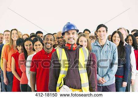 Portrait of confident construction worker and crowd View Large Photo Image Stock Image - Portrait of confident construction worker and crowd. Fotosearch