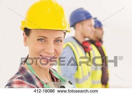 Portrait of confident construction worker View Large Photo Image Stock Photograph - Portrait of confident construction worker. Fotosearch