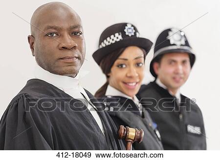 Portrait of confident judge and police View Large Photo Image Stock Photo - Portrait of confident judge and police. Fotosearch