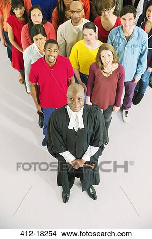 Portrait of crowd behind confident judge View Large Photo Image Picture - Portrait of crowd behind confident judge. Fotosearch