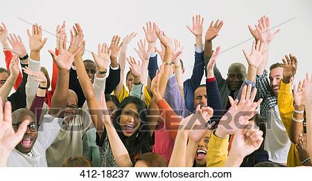 Stock Photo - Portrait of diverse crowd cheering. Fotosearch