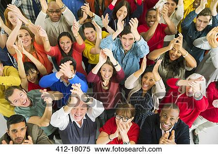 Portrait of diverse crowd clapping View Large Photo Image Stock Photography - Portrait of diverse crowd clapping. Fotosearch