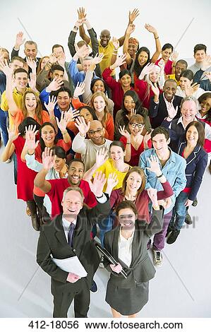 Portrait of diverse workers waving View Large Photo Image Stock Photograph - Portrait of diverse workers waving. Fotosearch