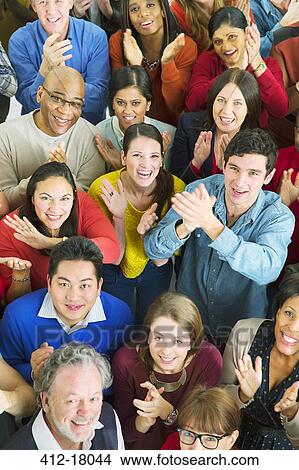 Picture - Portrait of happy crowd clapping. Fotosearch