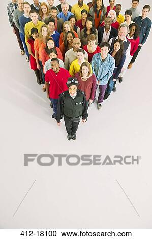 Portrait of policewoman and diverse crowd View Large Photo Image Stock Image - Portrait of policewoman and diverse crowd. Fotosearch