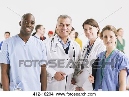 Portrait of smiling doctors and nurses View Large Photo Image Picture - Portrait of smiling doctors and nurses. Fotosearch