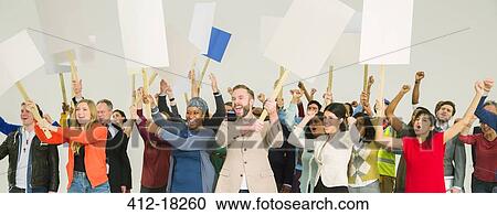 Protesters waving picket signs View Large Photo Image Stock Image - Protesters waving picket signs. Fotosearch