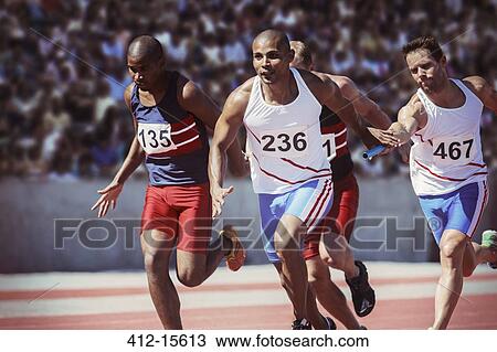 Relay runners exchanging batons on track View Large Photo Image Stock Image - Relay runners exchanging batons on track. Fotosearch