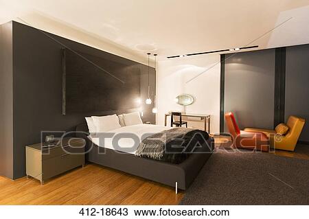 Rug and painting in modern bedroom View Large Photo Image Stock Image - Rug and painting in modern bedroom. Fotosearch