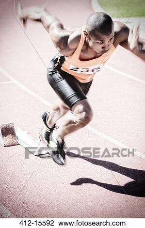 Runner taking off from starting block View Large Photo Image Stock Image - Runner taking off from starting block. Fotosearch