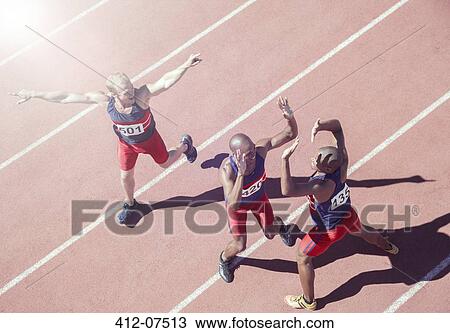 Runners cheering on track View Large Photo Image Stock Image - Runners cheering on track. Fotosearch
