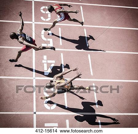Runners crossing finish line on track View Large Photo Image Picture - Runners crossing finish line on track. Fotosearch