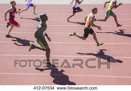 Runners racing on track View Large Photo Image Picture - Runners racing on track. Fotosearch