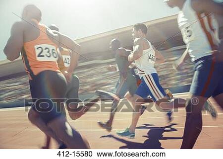 Runners racing on track View Large Photo Image Stock Image - Runners racing on track. Fotosearch