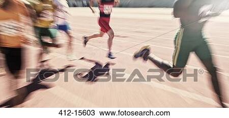 Stock Image - Runners racing on track. Fotosearch