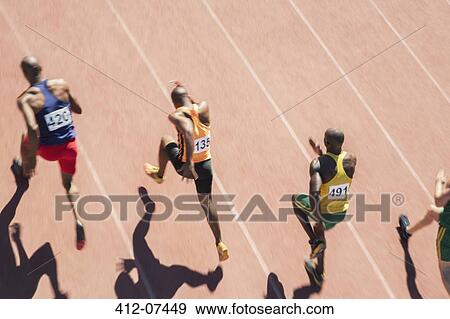 Stock Photo - Runners racing on track. Fotosearch