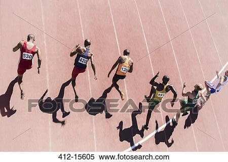 Runners racing on track View Large Photo Image Stock Photography - Runners racing on track. Fotosearch