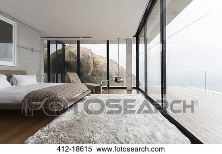 Shag rug and glass walls in modern bedroom View Large Photo Image Stock Photography - Shag rug and glass walls in modern bedroom. Fotosearch