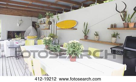 Shelves and wall ornaments in modern dining room View Large Photo Image Stock Image - Shelves and wall ornaments in modern dining room. Fotosearch