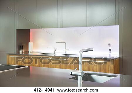 Sinks and faucets in modern kitchen View Large Photo Image Stock Image - Sinks and faucets in modern kitchen. Fotosearch