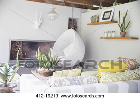 Sofa, chair and fireplace in modern living room View Large Photo Image Stock Photo - Sofa, chair and fireplace in modern living room. Fotosearch