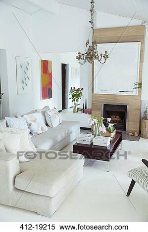 Sofa, coffee table and fireplace in modern living room View Large Photo Image Stock Photography - Sofa, coffee table and fireplace in modern living room. Fotosearch