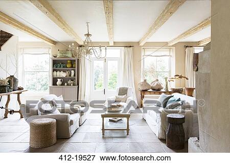 Sofas and coffee table in rustic living room View Large Photo Image Stock Photo - Sofas and coffee table in rustic living room. Fotosearch