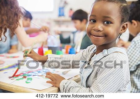 Student painting in class View Large Photo Image Stock Image - Student painting in class. Fotosearch