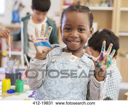 Student with messy hands in classroom View Large Photo Image Stock Image - Student with messy hands in classroom. Fotosearch