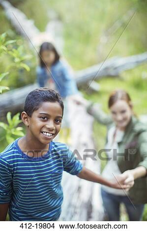 Students and teacher walking in forest View Large Photo Image Picture - Students and teacher walking in forest. Fotosearch