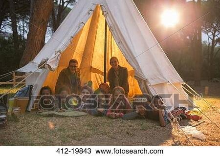 Students and teachers smiling in teepee at campsite View Large Photo Image Stock Image - Students and teachers smiling in teepee at campsite. Fotosearch