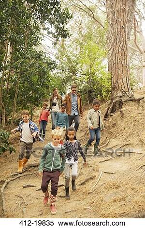Students and teachers walking in forest View Large Photo Image Stock Photography - Students and teachers walking in forest. Fotosearch