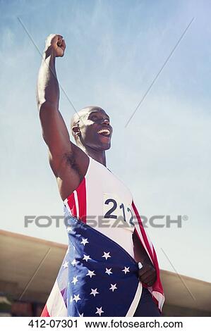 Track and field athlete cheering on track View Large Photo Image Stock Image - Track and field athlete cheering on track. Fotosearch