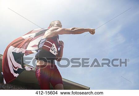 Track and field athlete cheering with British flag View Large Photo Image Picture - Track and field athlete cheering with British flag. Fotosearch