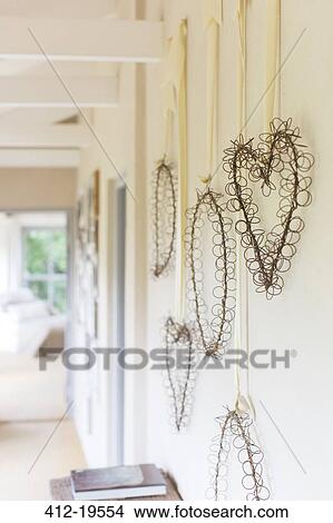 Wall hangings in rustic hallway View Large Photo Image Picture - Wall hangings in rustic hallway. Fotosearch