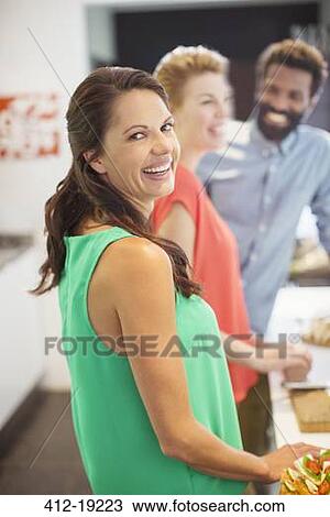 Woman laughing at party View Large Photo Image Stock Image - Woman laughing at party. Fotosearch