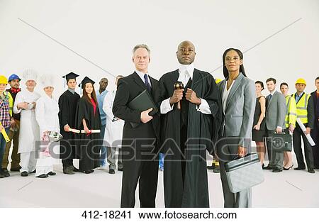Workforce behind confident lawyers and judge View Large Photo Image Stock Image - Workforce behind confident lawyers and judge. Fotosearch