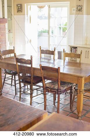 Dinning table in household kitchen View Large Photo Image Stock Image - Dinning table in household kitchen . Fotosearch