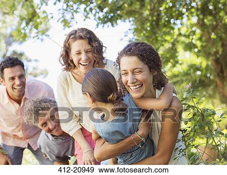 Family playing with family outdoors View Large Photo Image Stock Photo - Family playing with family outdoors. Fotosearch