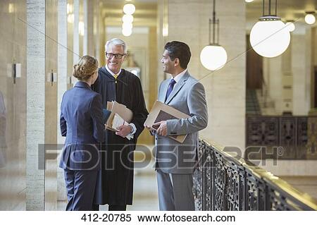 Judge and lawyers talking in courthouse View Large Photo Image Stock Photography - Judge and lawyers talking in courthouse. Fotosearch