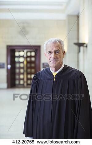 Stock Photography - Judge smiling in courthouse. Fotosearch