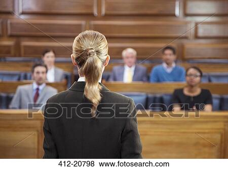 Stock Photo - Lawyer pleading case to jury in court. Fotosearch