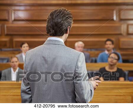 Stock Photography - Lawyer pleading case to jury in court. Fotosearch