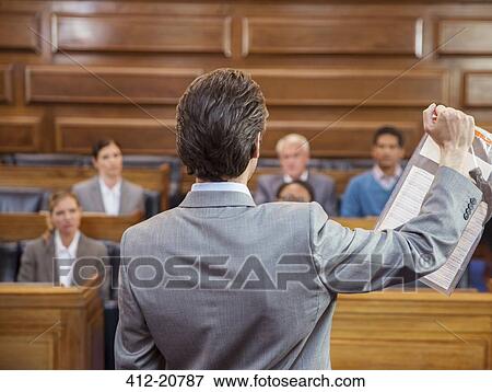 Lawyer showing documents to jury in court View Large Photo Image Stock Photo - Lawyer showing documents to jury in court . Fotosearch