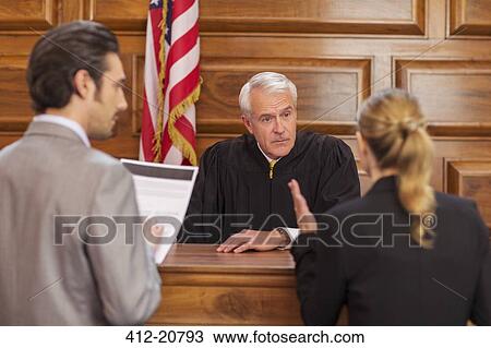 Lawyers pleading case to judge in court View Large Photo Image Stock Image - Lawyers pleading case to judge in court. Fotosearch
